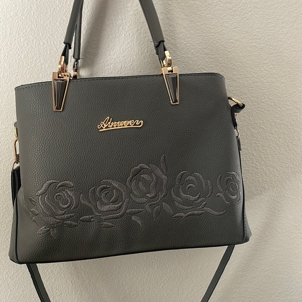 Super cute high quality dark grey purse with gold accents and rose embroidery